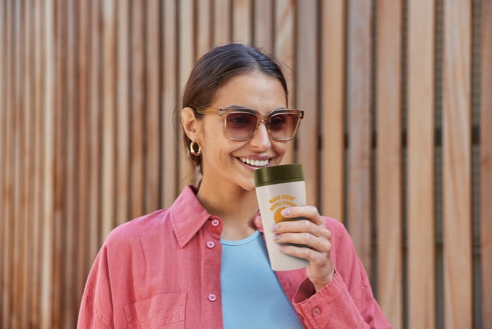 A smiling woman with a goodcup